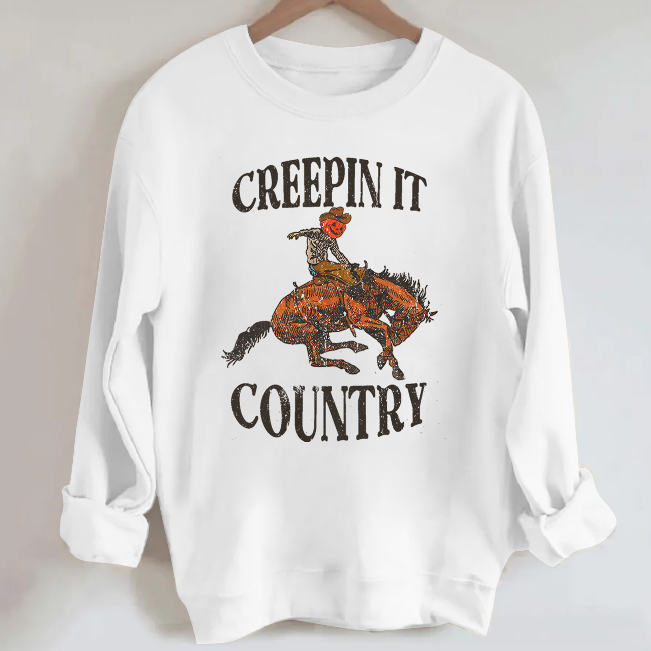 Pumpkin Cowboy Taming the Horse Sweatshirt