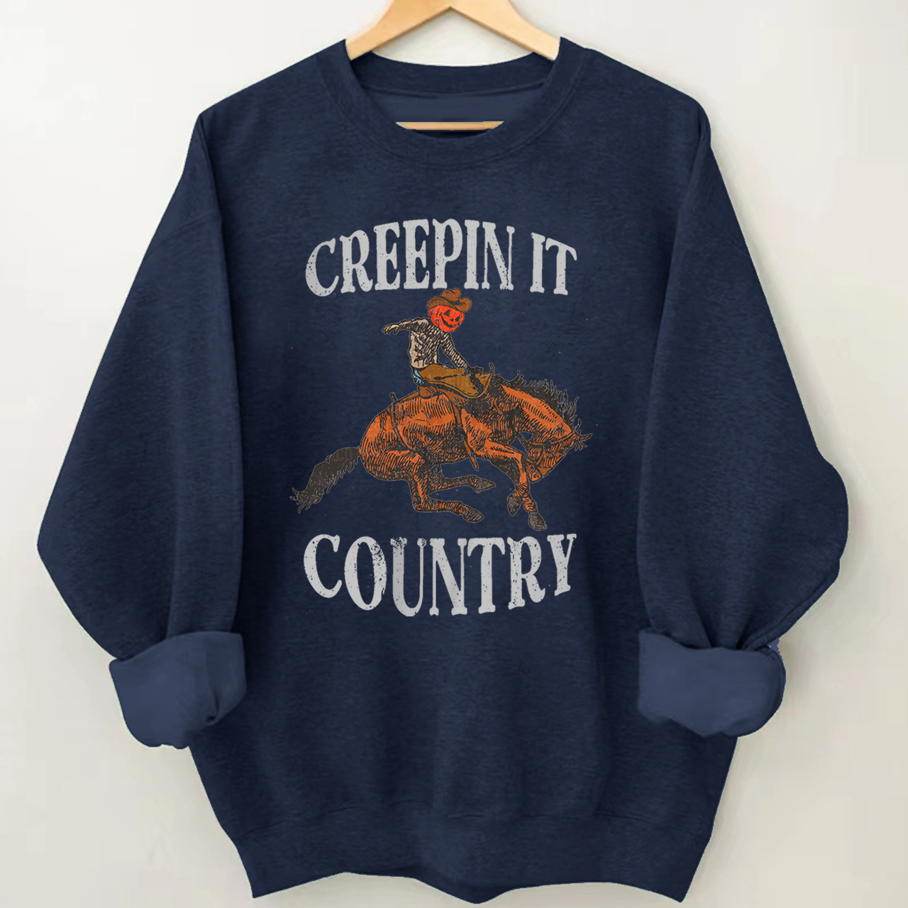 Pumpkin Cowboy Taming the Horse Sweatshirt