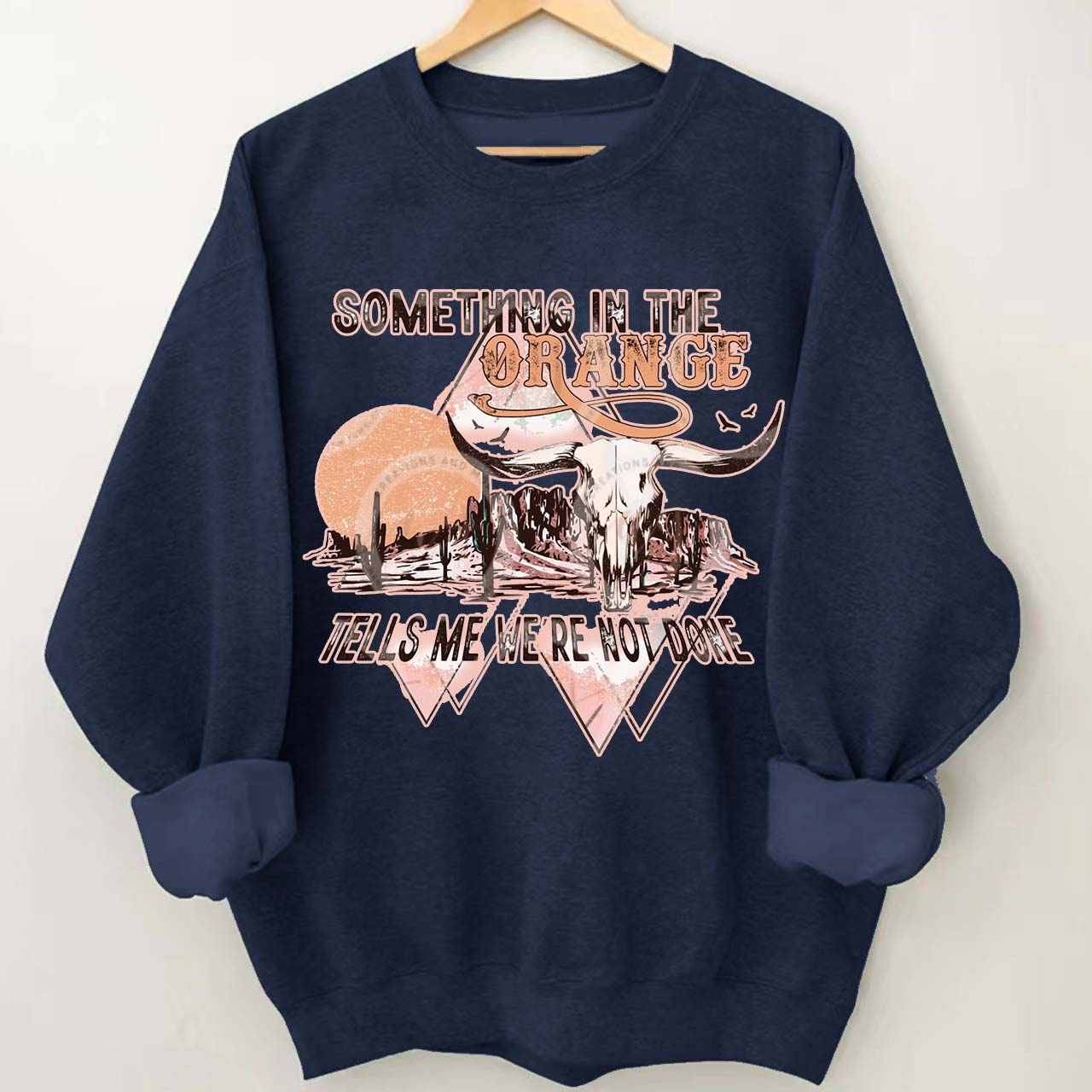 Tells We're Not Done Sweatshirt