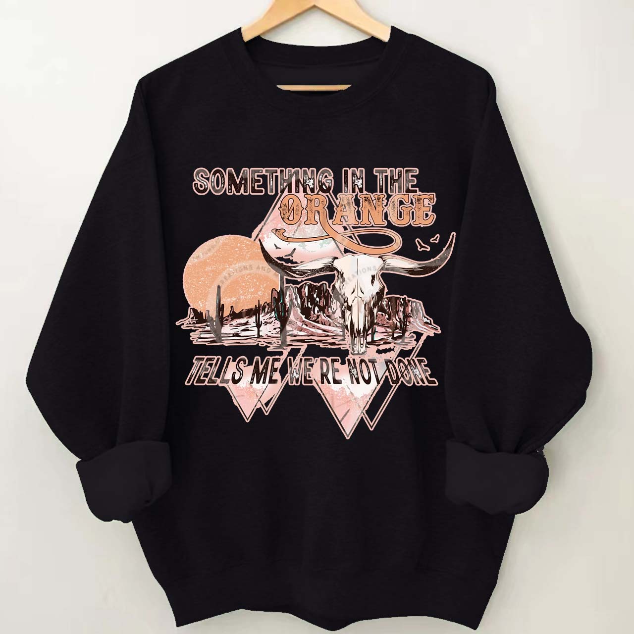 Tells We're Not Done Sweatshirt