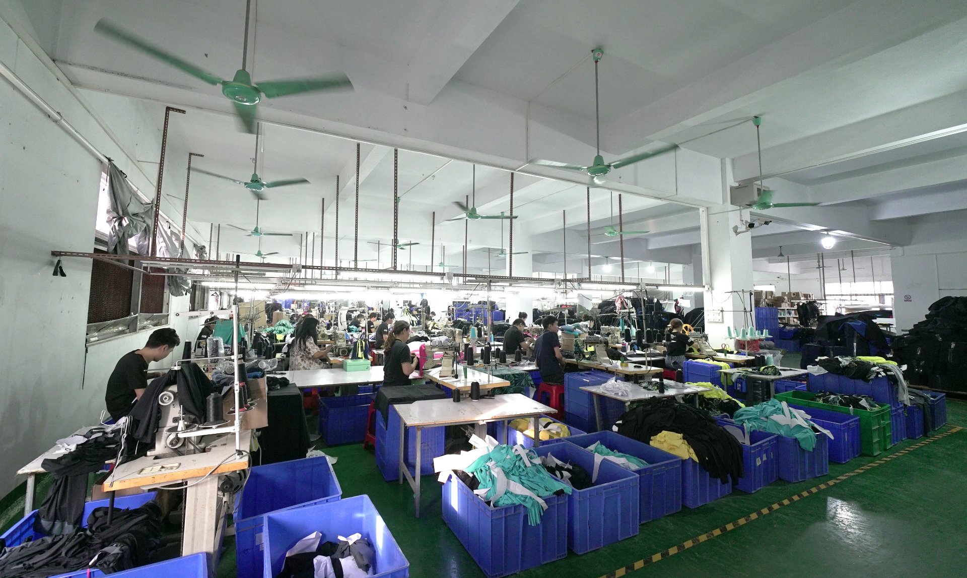 SBART production floor — cutting, bonding and sewing lines for wetsuits and swimwear