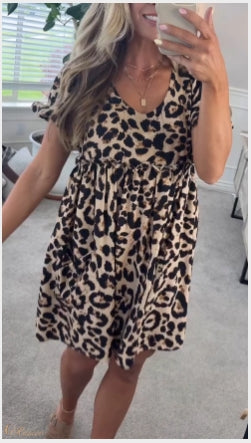 Vestido casual para mulher com estampado de leopardo e gola redonda