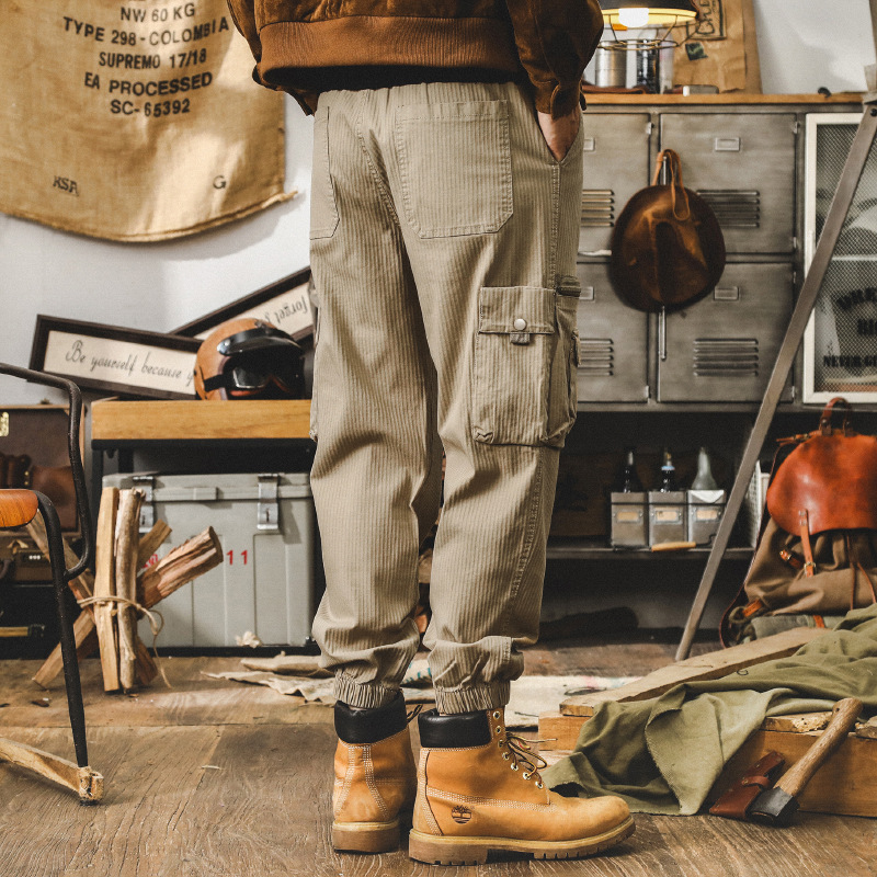美式複古卡其色工裝褲子男秋季寬松休閑長褲潮牌多口袋男士束腳褲