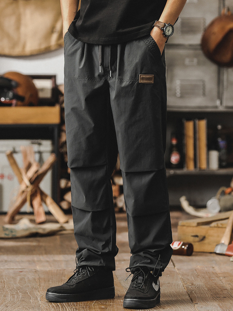 春季新款休閒褲子男潮牌痞帥寬鬆直筒男士工裝褲薄款傘兵衝鋒褲男