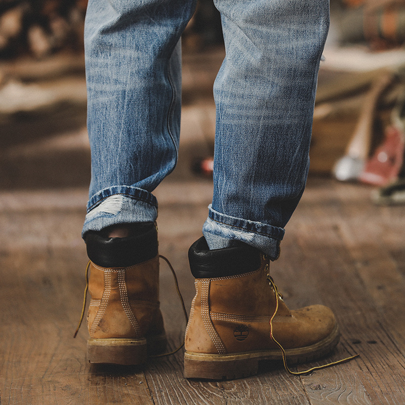 春季新款淺藍色牛仔褲男寬鬆直筒美式痞帥破洞男褲磨白水洗休閒褲