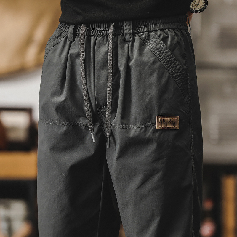 春季新款休閒褲子男潮牌痞帥寬鬆直筒男士工裝褲薄款傘兵衝鋒褲男