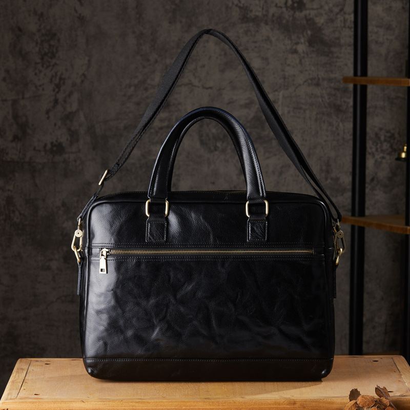 手工頭層牛皮公文包男士真皮大容量單肩斜挎包植鞣牛皮商務手提包