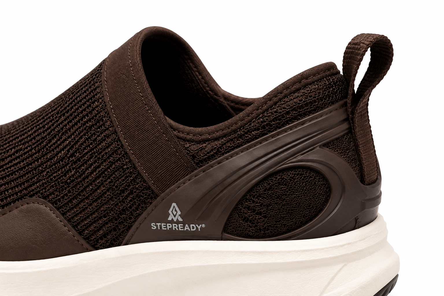 W1 structured heel, wide entry opening, and rear pull tab
