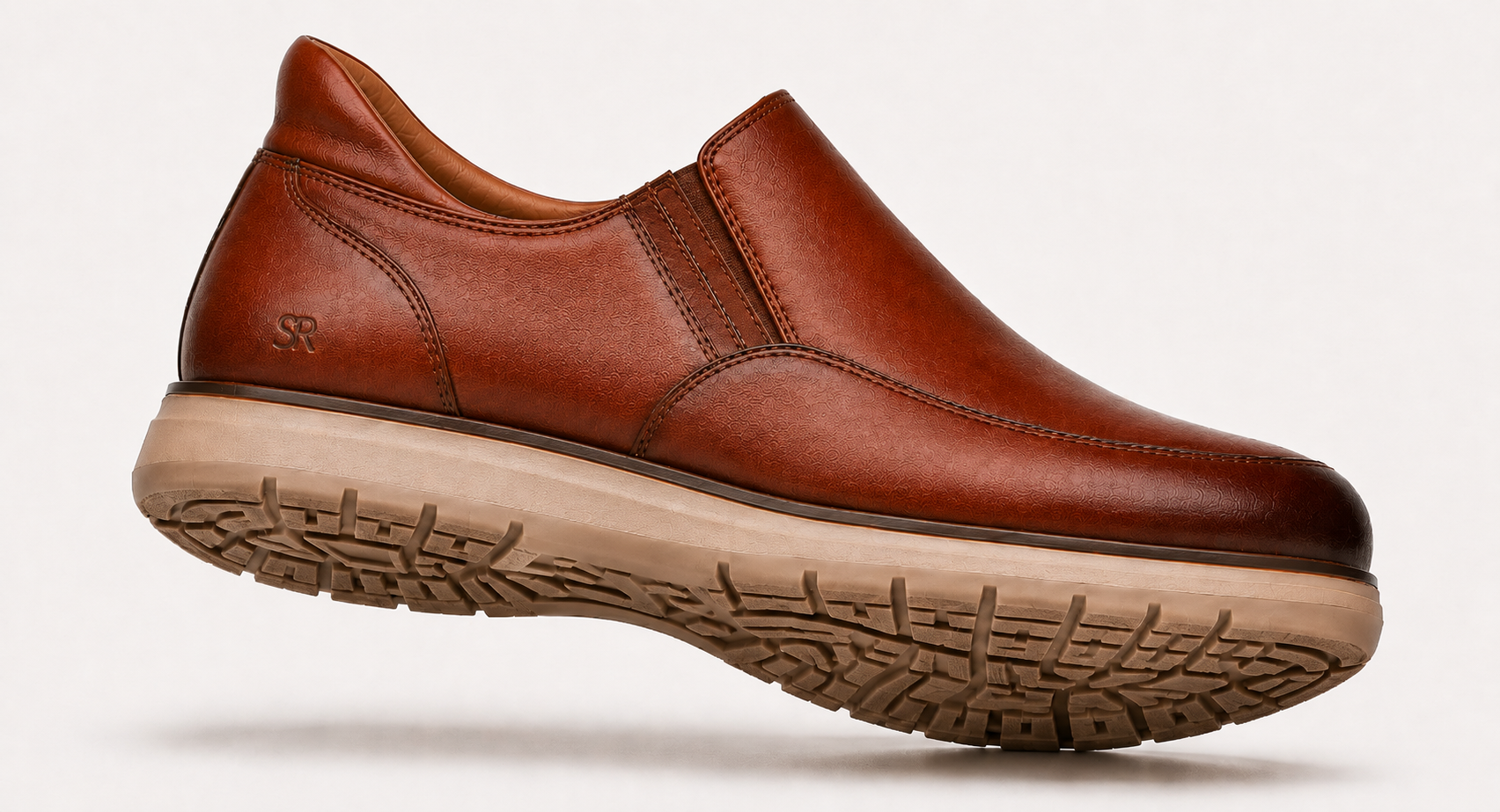 StepReady brown leather loafer showing slip-resistant outsole tread