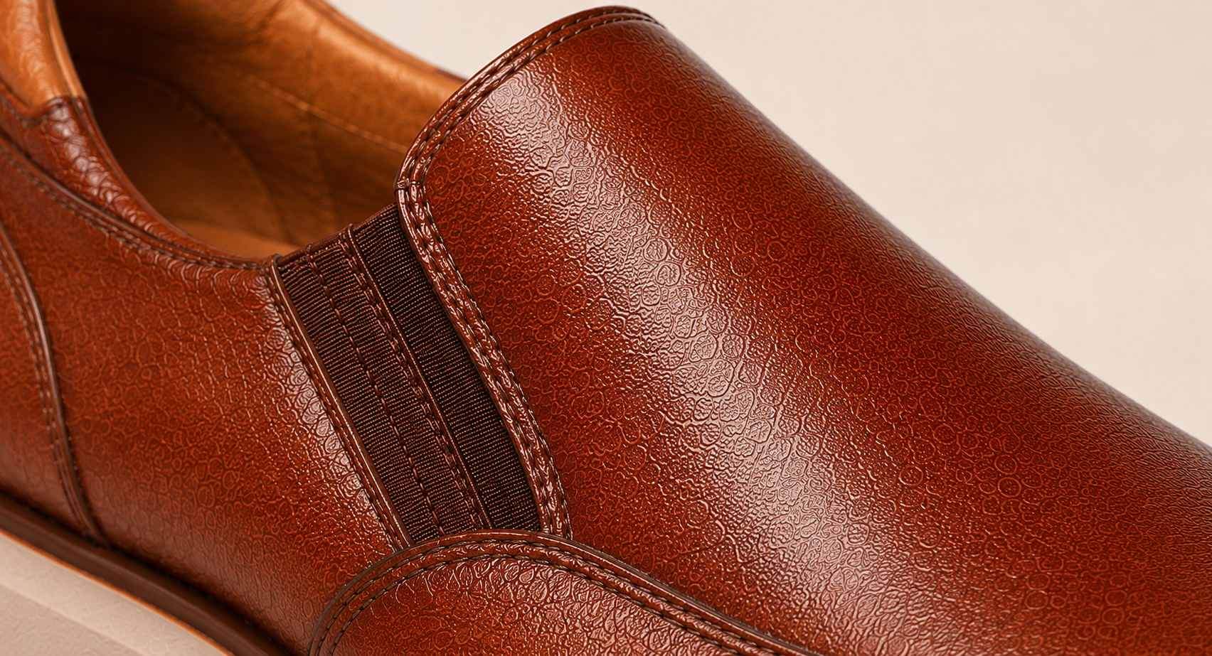 StepReady brown leather loafer close-up showing textured genuine leather upper