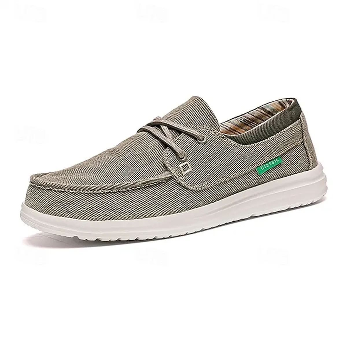 Close-up of the actual gray canvas weave, stitched seams and short laces