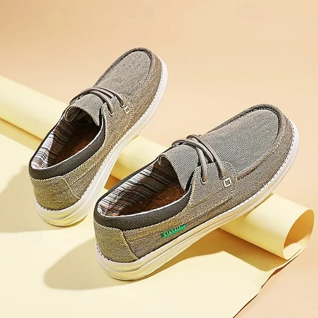 Original gray shoes viewed from above, showing the rounded toe and full forefoot