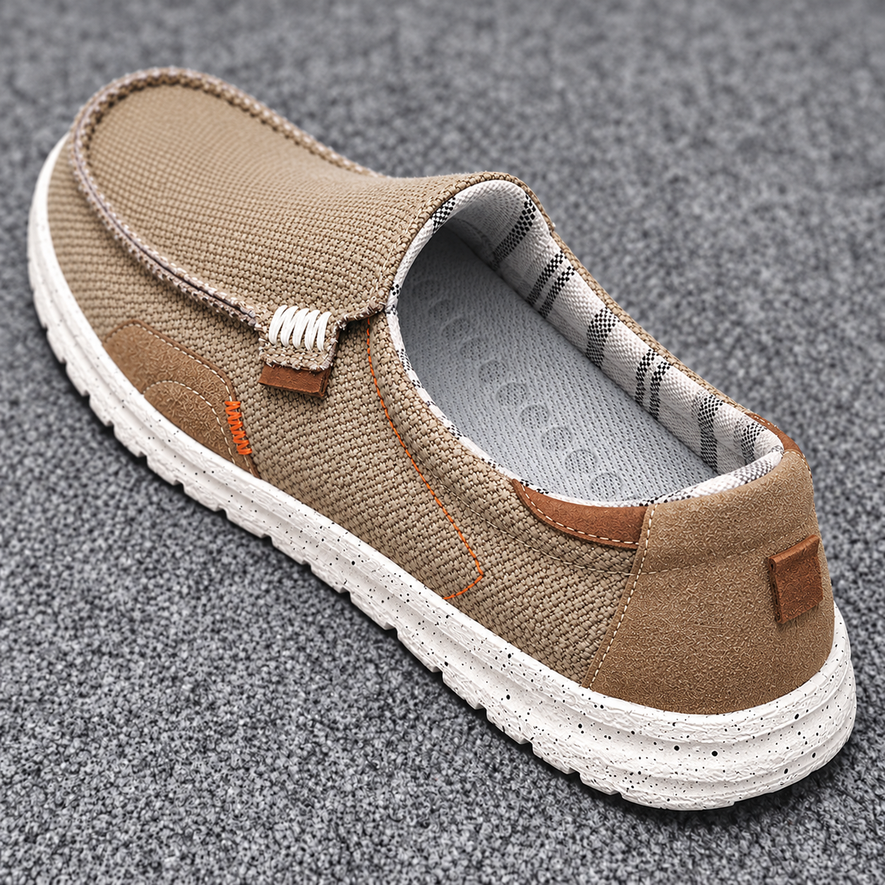 Khaki loafer collar and heel in a corrected rear three-quarter view