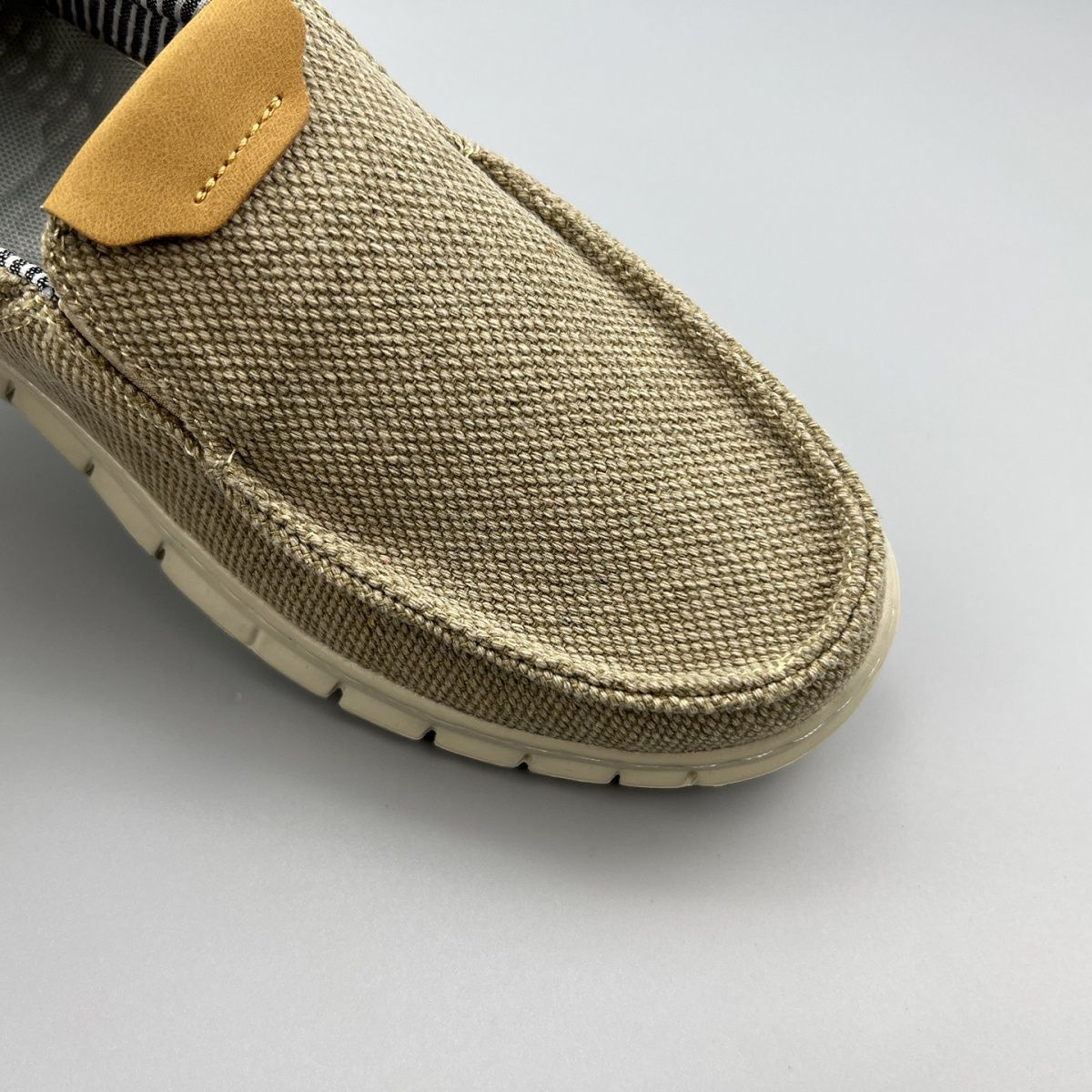 Original khaki canvas weave and rounded moccasin stitching