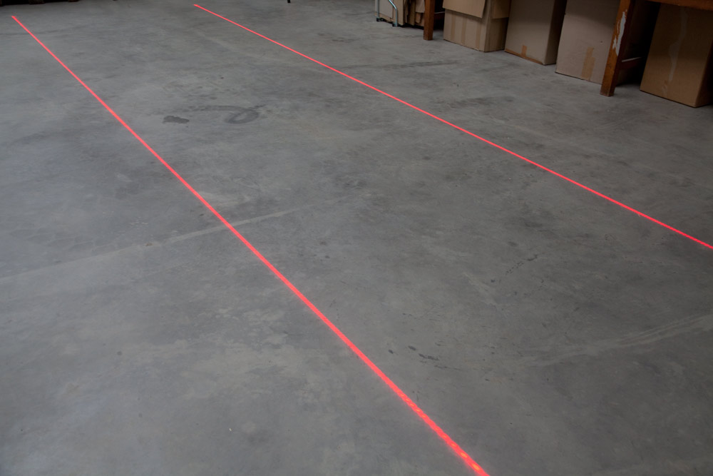 Laser line floor marking for logistics warehouse safety warning