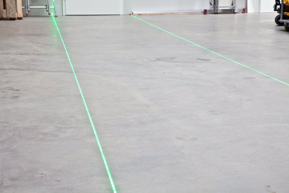 Laser line floor marking for logistics warehouse safety warning