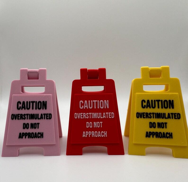Caution Overstimulated Desk Sign: Fun Workspace Boundary Marker