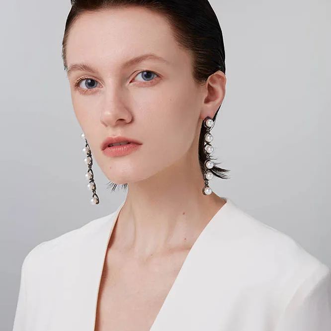Curvilinear Collection Pearl Drop Earrings With Figure Of 8 Shape