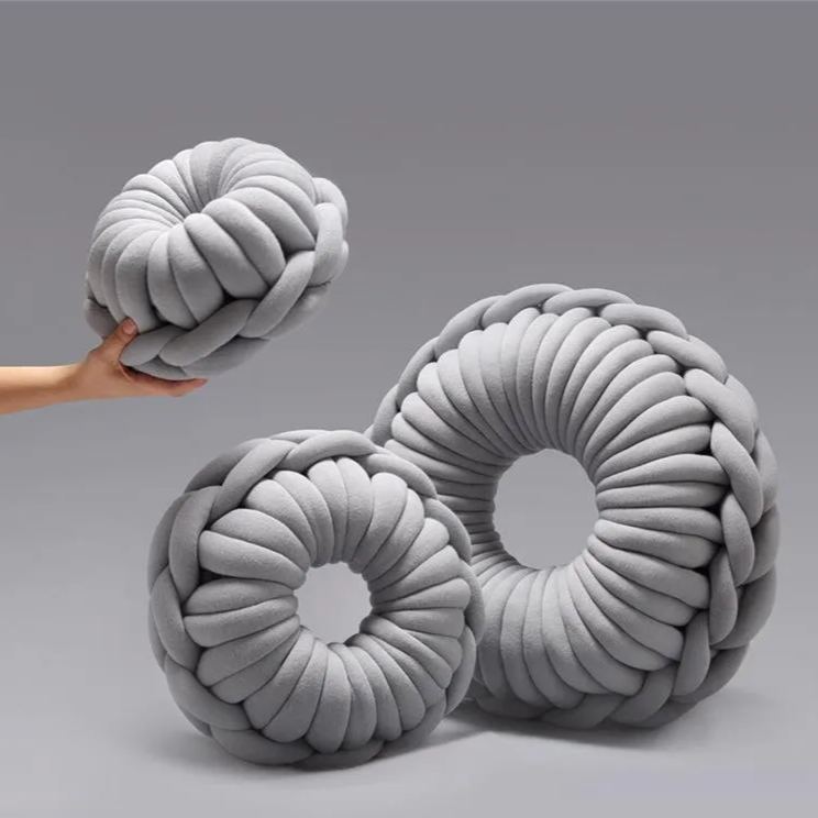 Finished Product Of Hand-Woven Donut Nap Pillow With Core-Filled Cotton Yarn