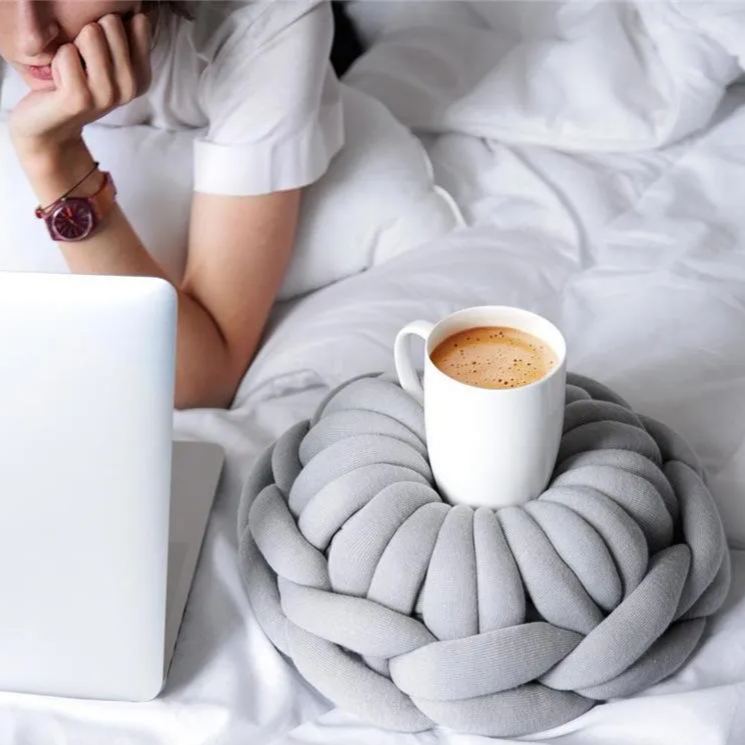 Finished Product Of Hand-Woven Donut Nap Pillow With Core-Filled Cotton Yarn