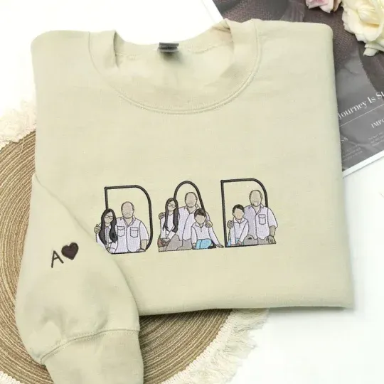 Custom Family Embroidered Sweatshirt A truly one-of-a-kind gift for the people who mean everything. Wrap your most cherished moments in cozy stitches with our Custom Family Embroidered Sweatshirt. Whether it’s a sw A Unique and Heartwarming Gift for Dad