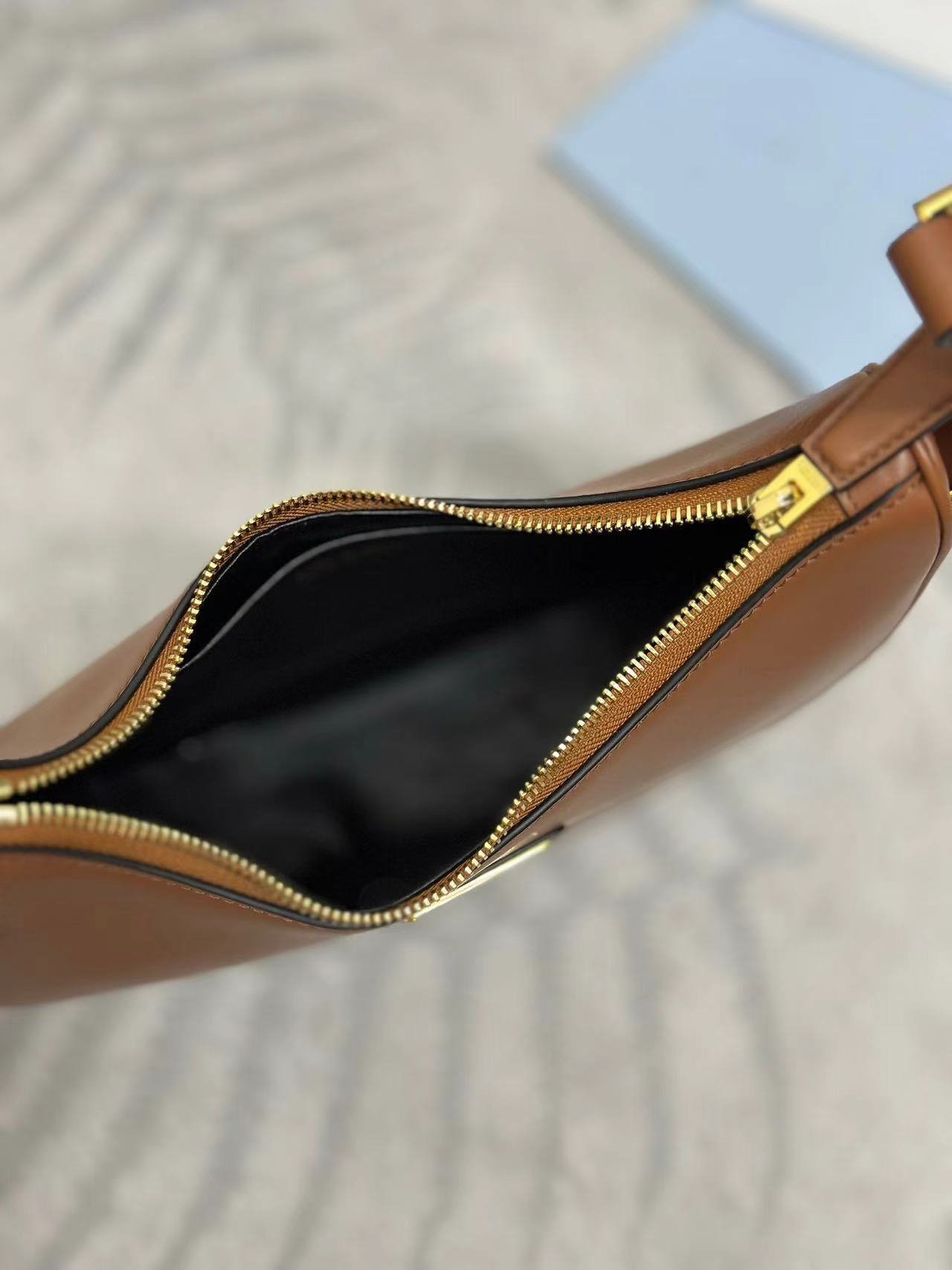 Prada Arqué small leather shoulder bag