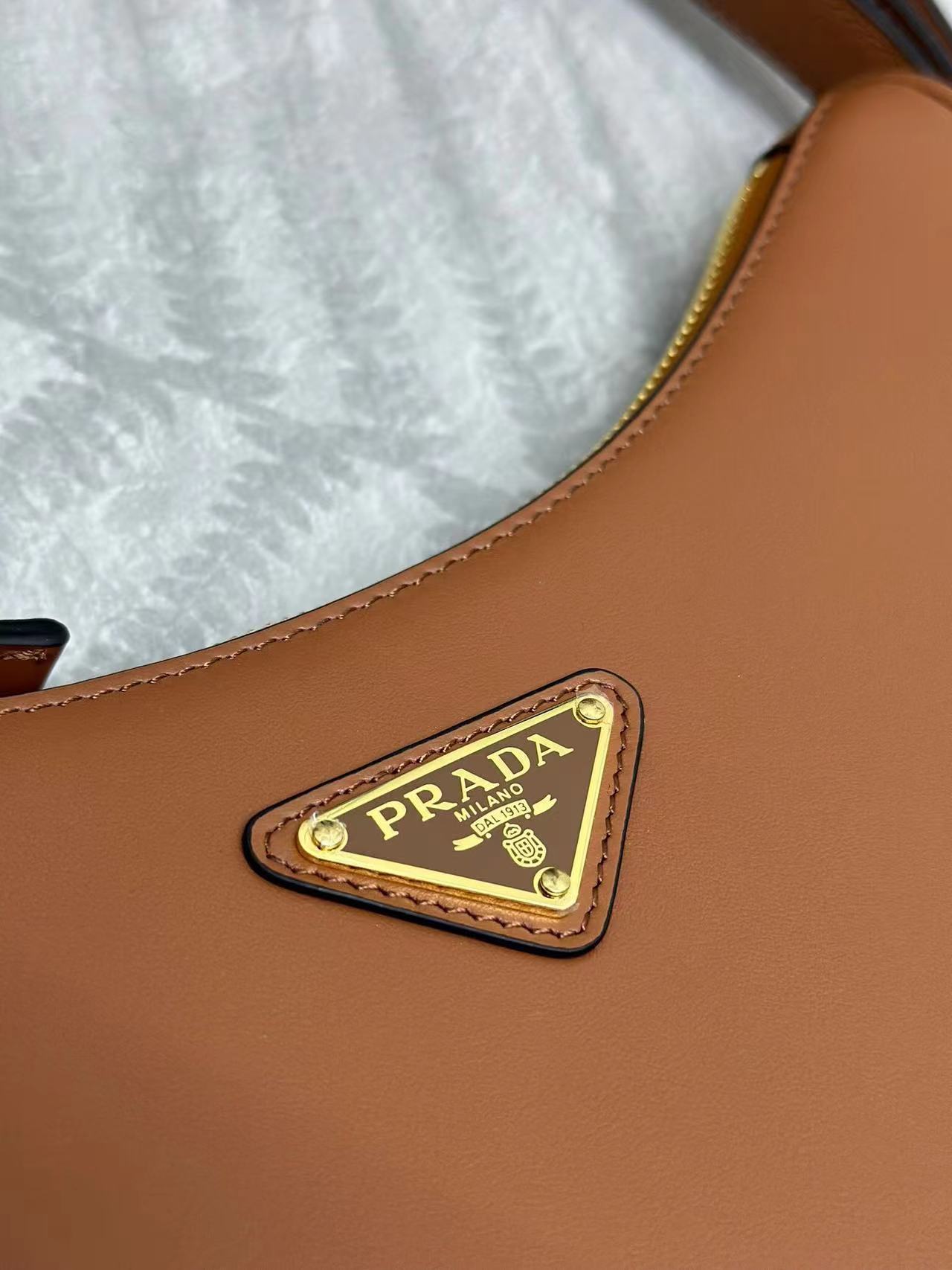 Prada Arqué small leather shoulder bag