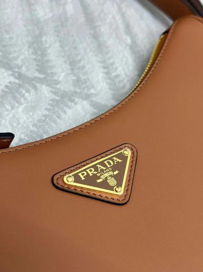 Prada Arqué small leather shoulder bag