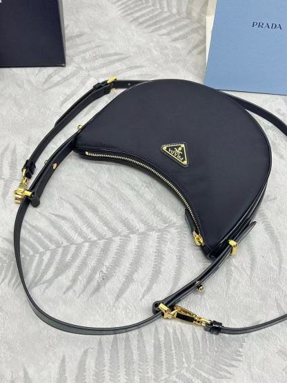 Prada Arqué small Re-Nylon and brushed leather shoulder bag