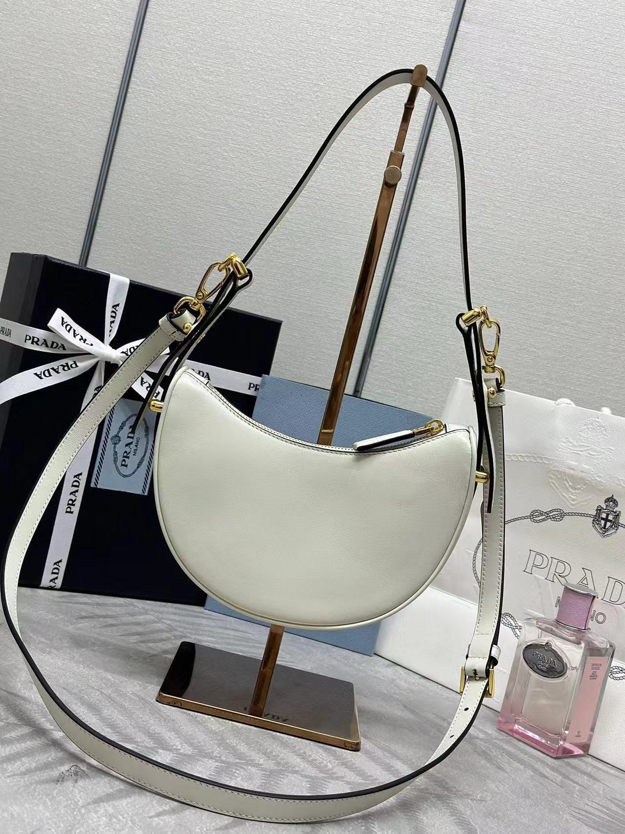 Prada Arqué leather mini shoulder bag