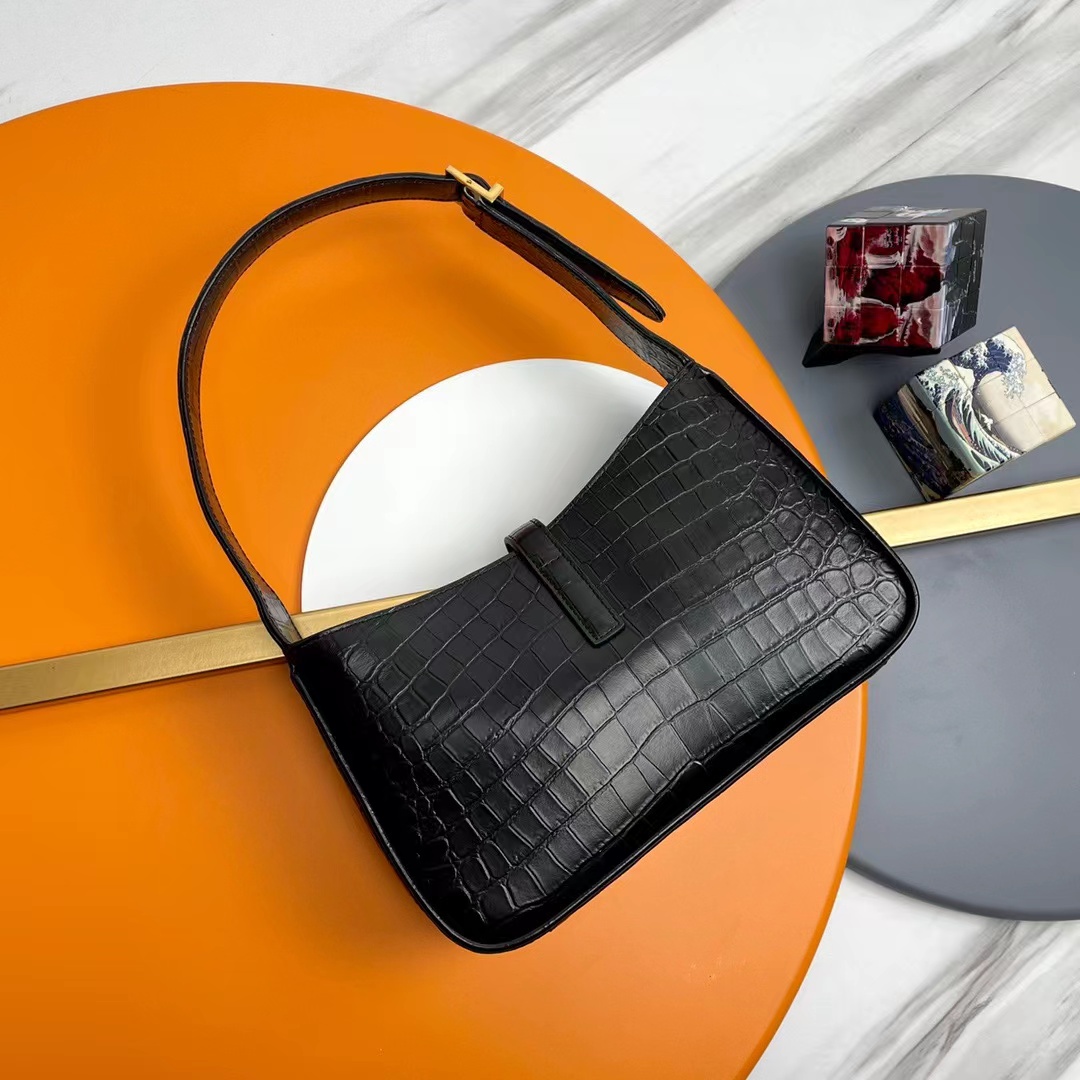 YSL LE 5 À 7 in crocodile-embossed shiny leather