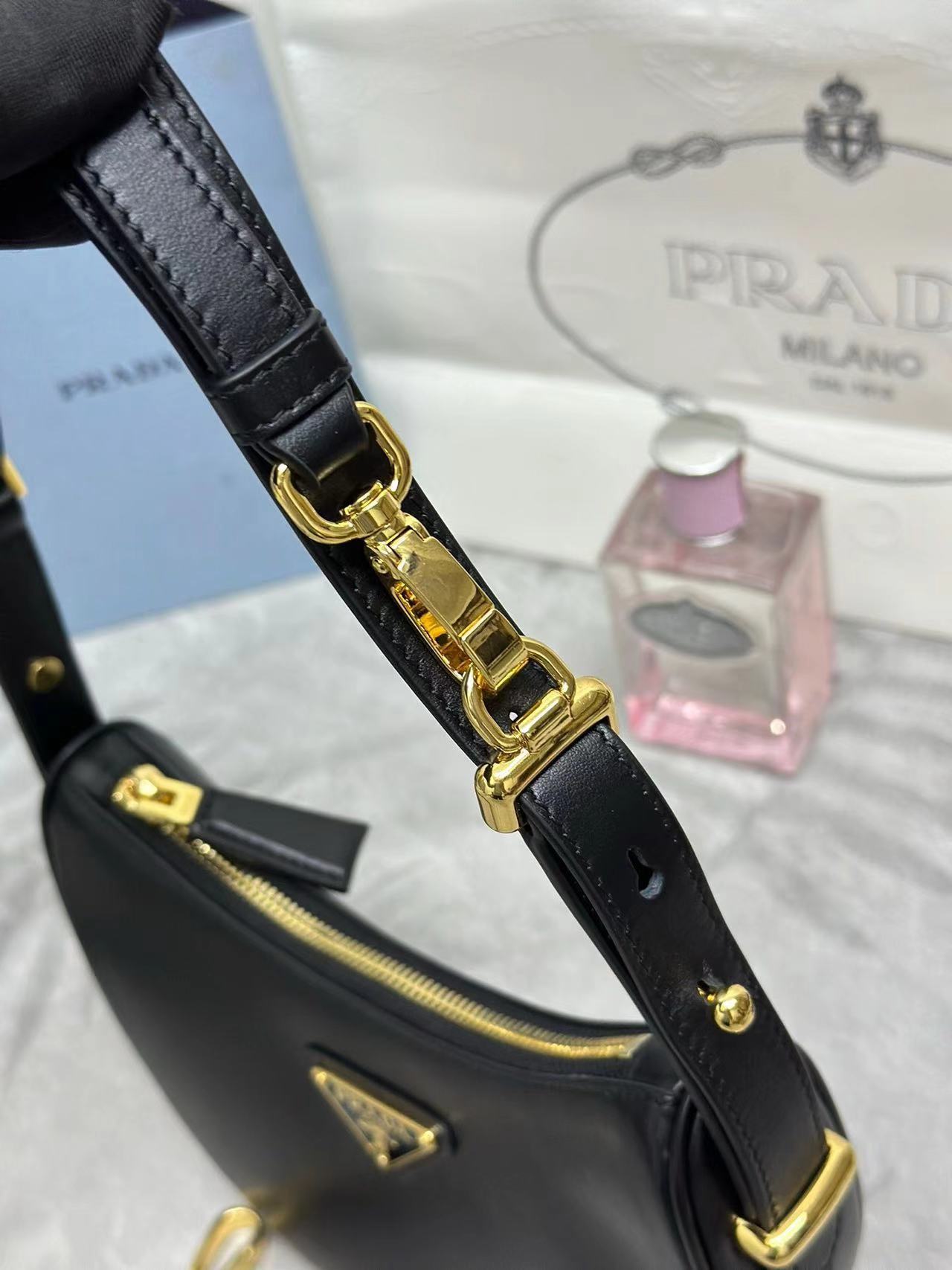 Prada Arqué leather mini shoulder bag