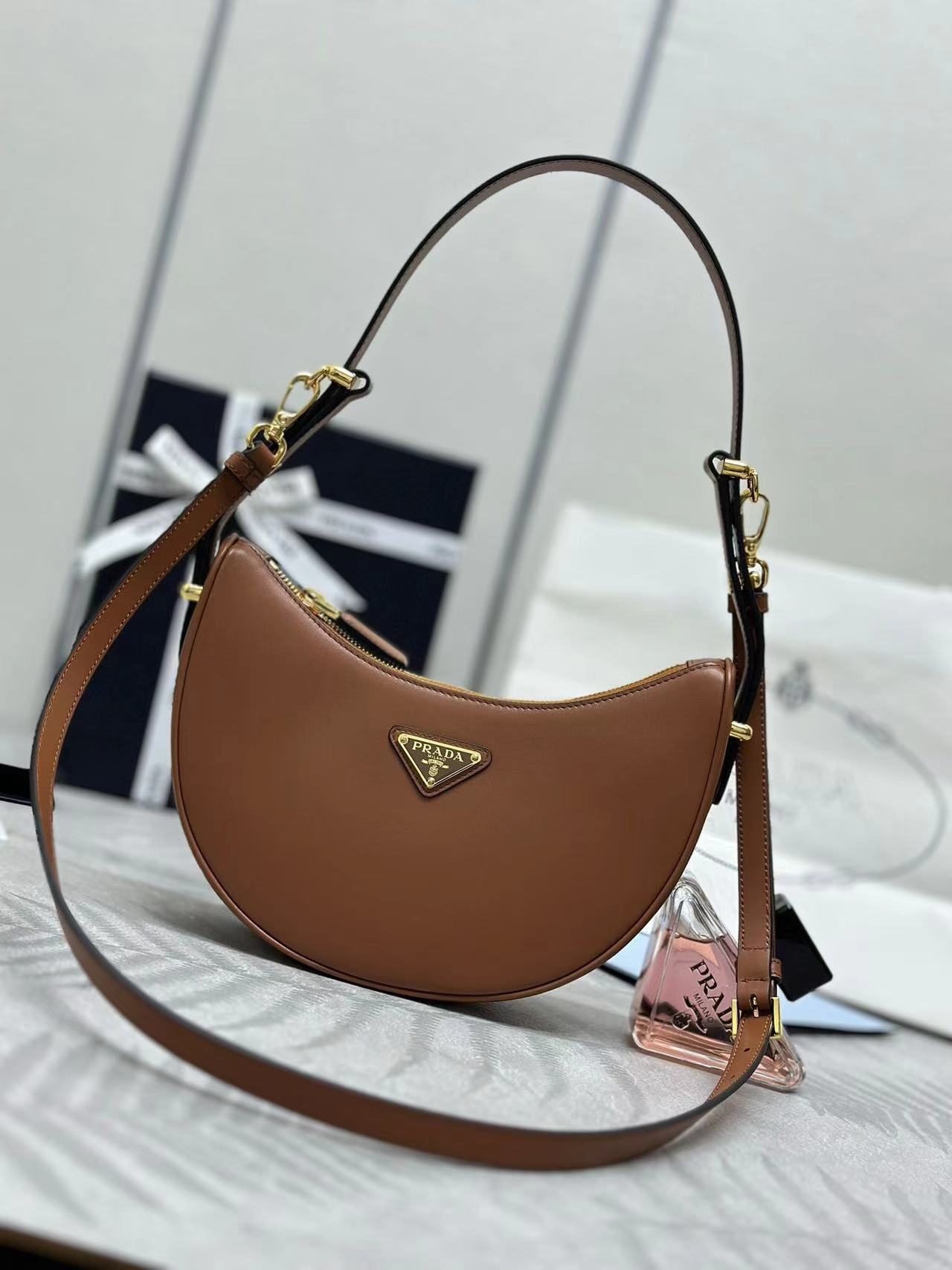 Prada Arqué small leather shoulder bag