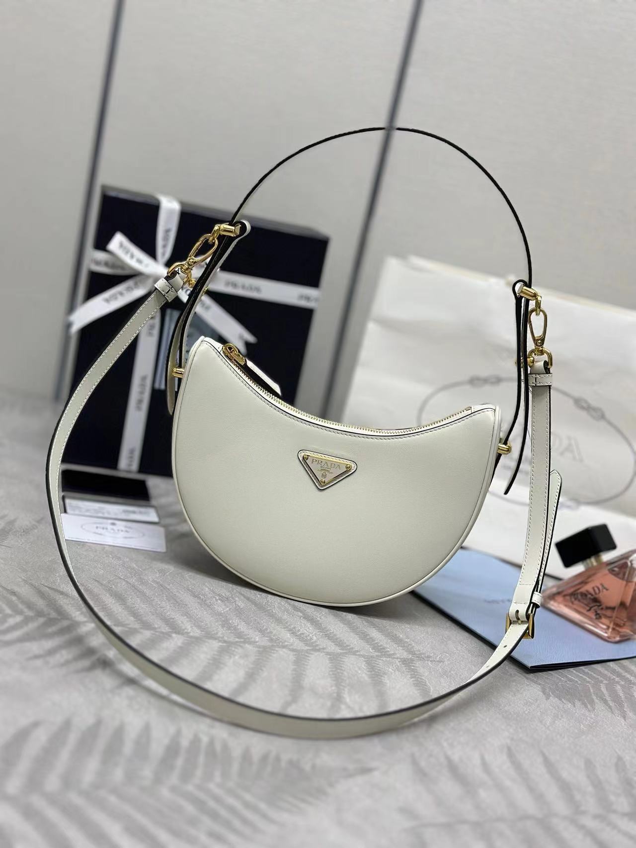 Prada Arqué small leather shoulder bag