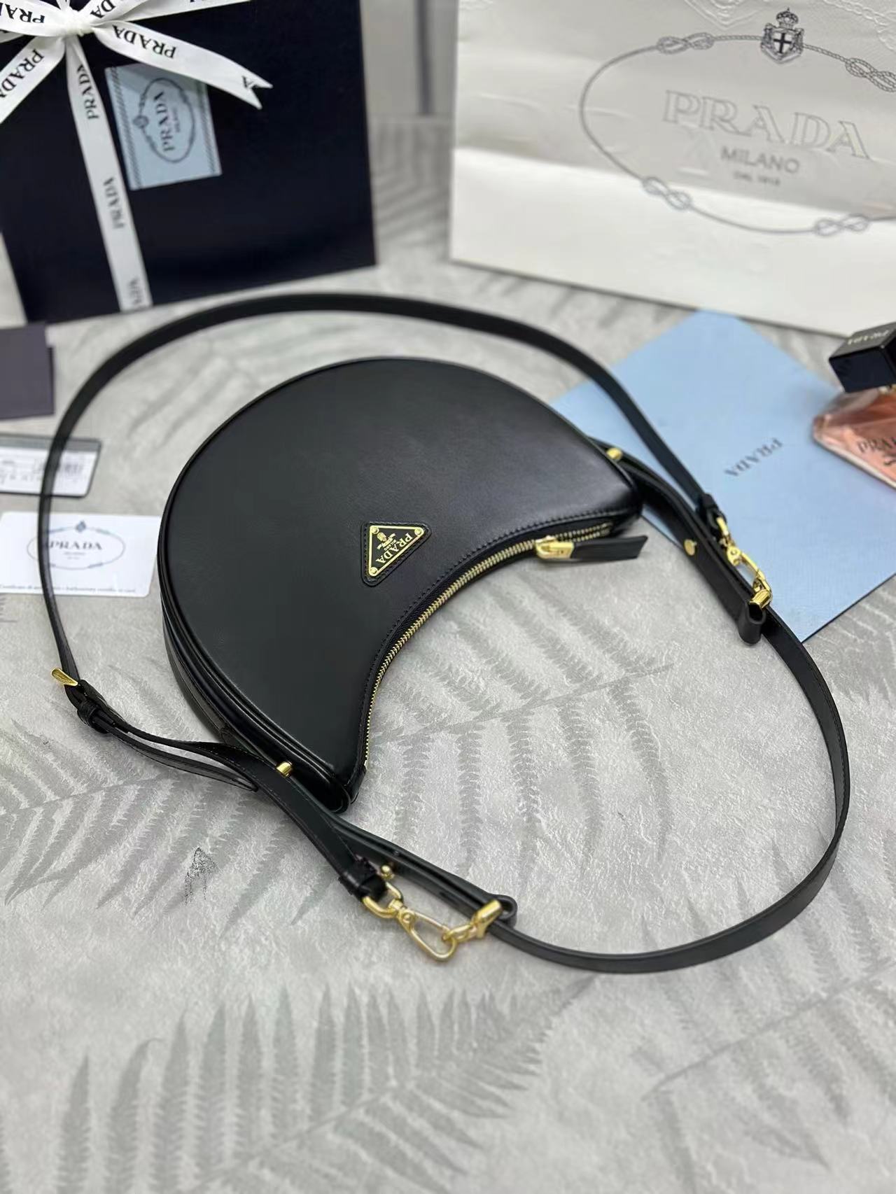 Prada Arqué small leather shoulder bag