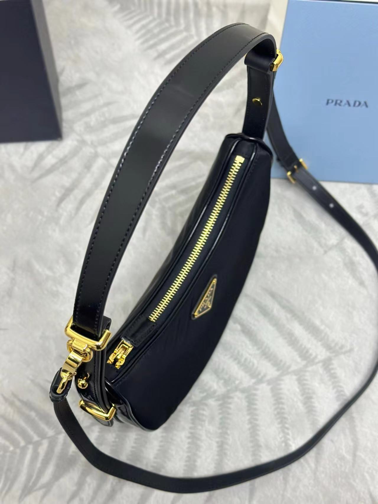 Prada Arqué small Re-Nylon and brushed leather shoulder bag