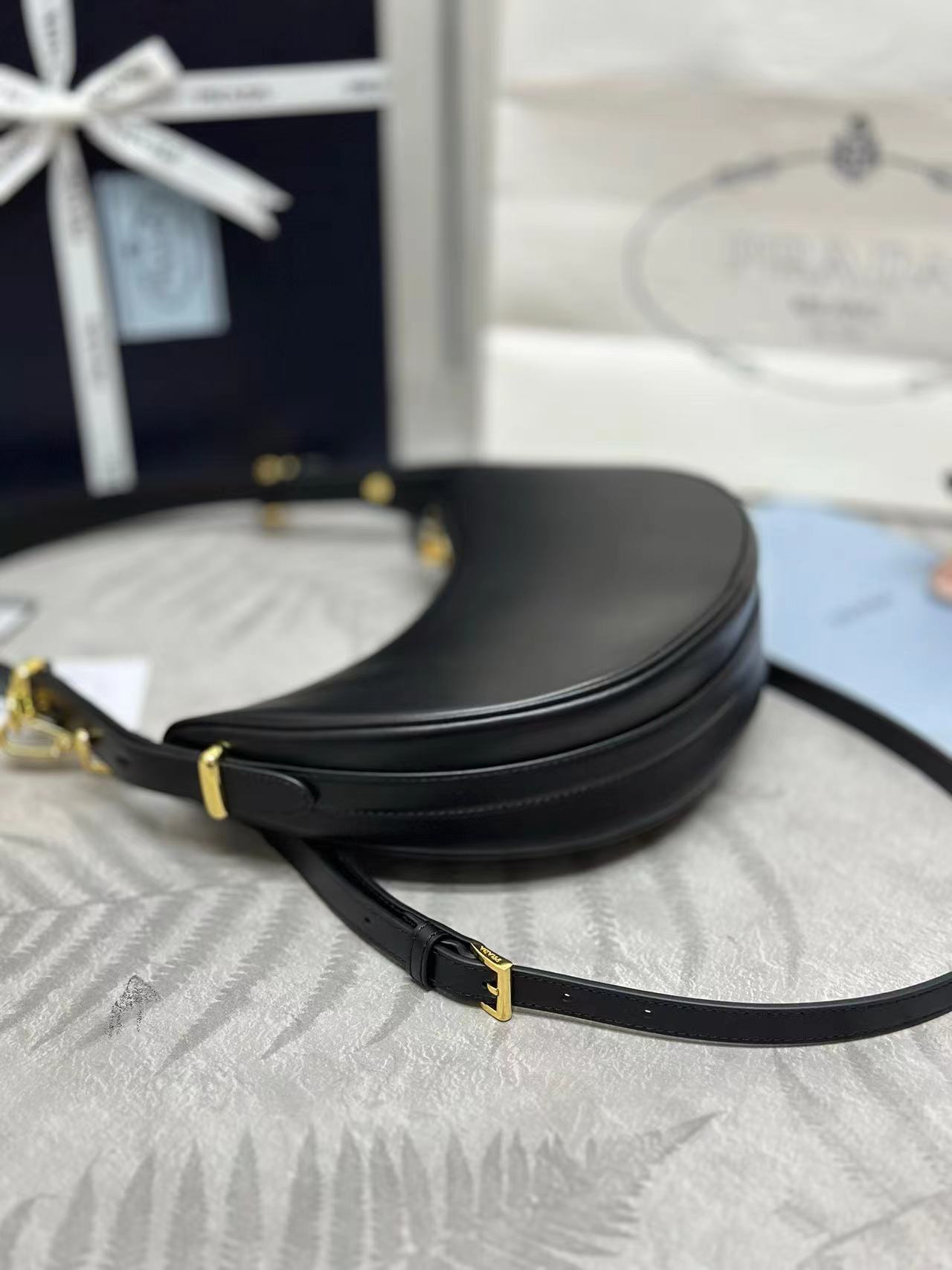 Prada Arqué small leather shoulder bag