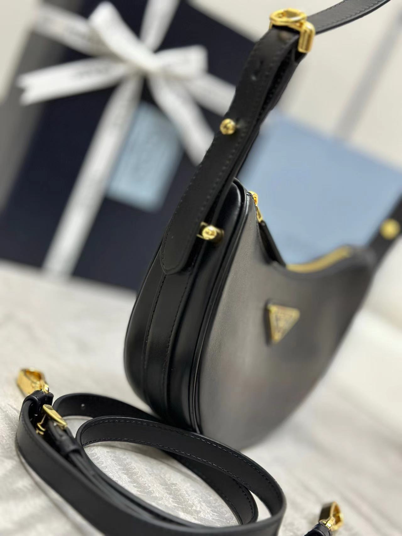 Prada Arqué leather mini shoulder bag