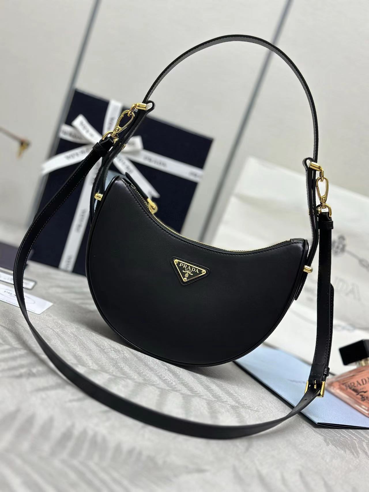 Prada Arqué small leather shoulder bag
