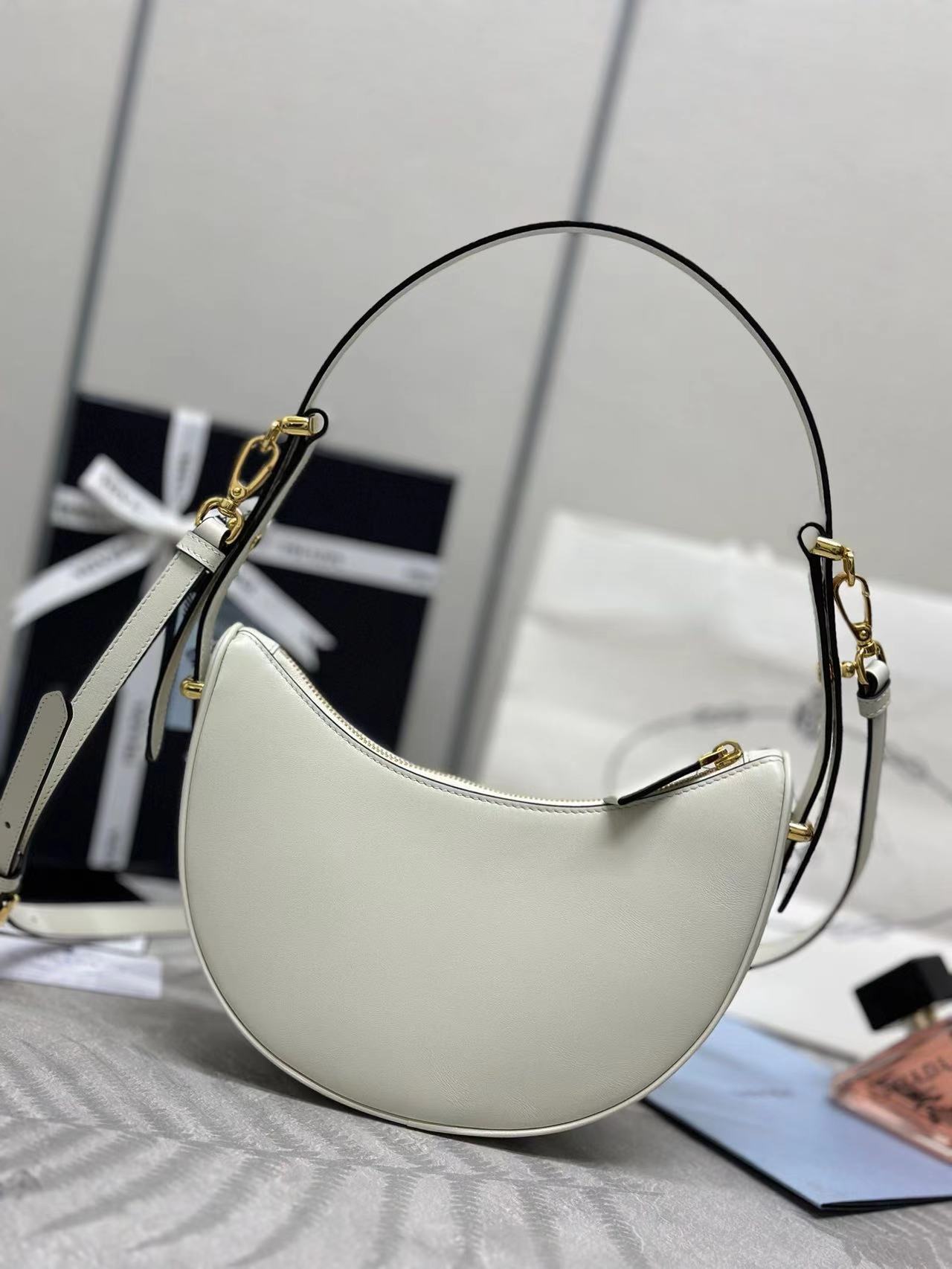 Prada Arqué small leather shoulder bag