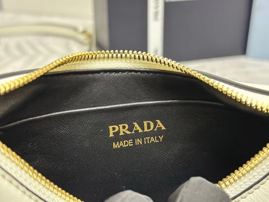 Prada Arqué leather mini shoulder bag