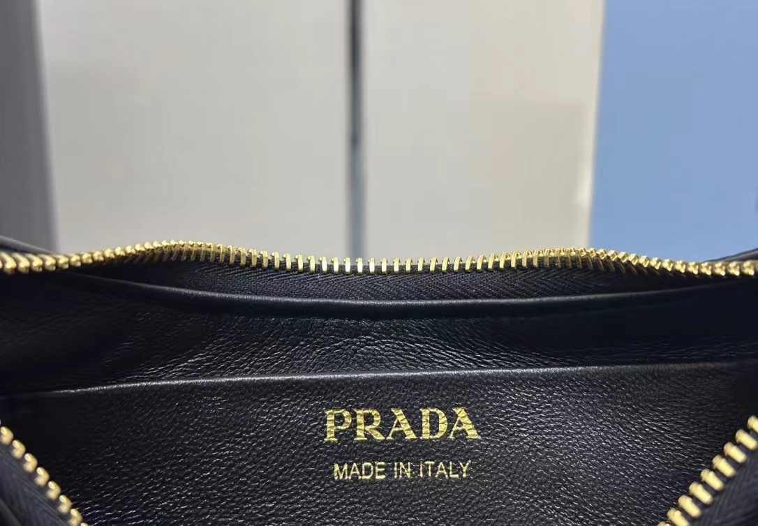 Prada Arqué small Re-Nylon and brushed leather shoulder bag