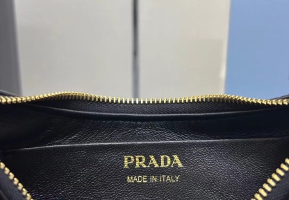 Prada Arqué small Re-Nylon and brushed leather shoulder bag
