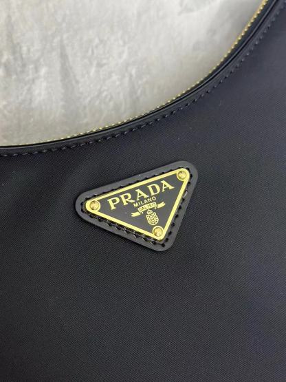 Prada Arqué small Re-Nylon and brushed leather shoulder bag