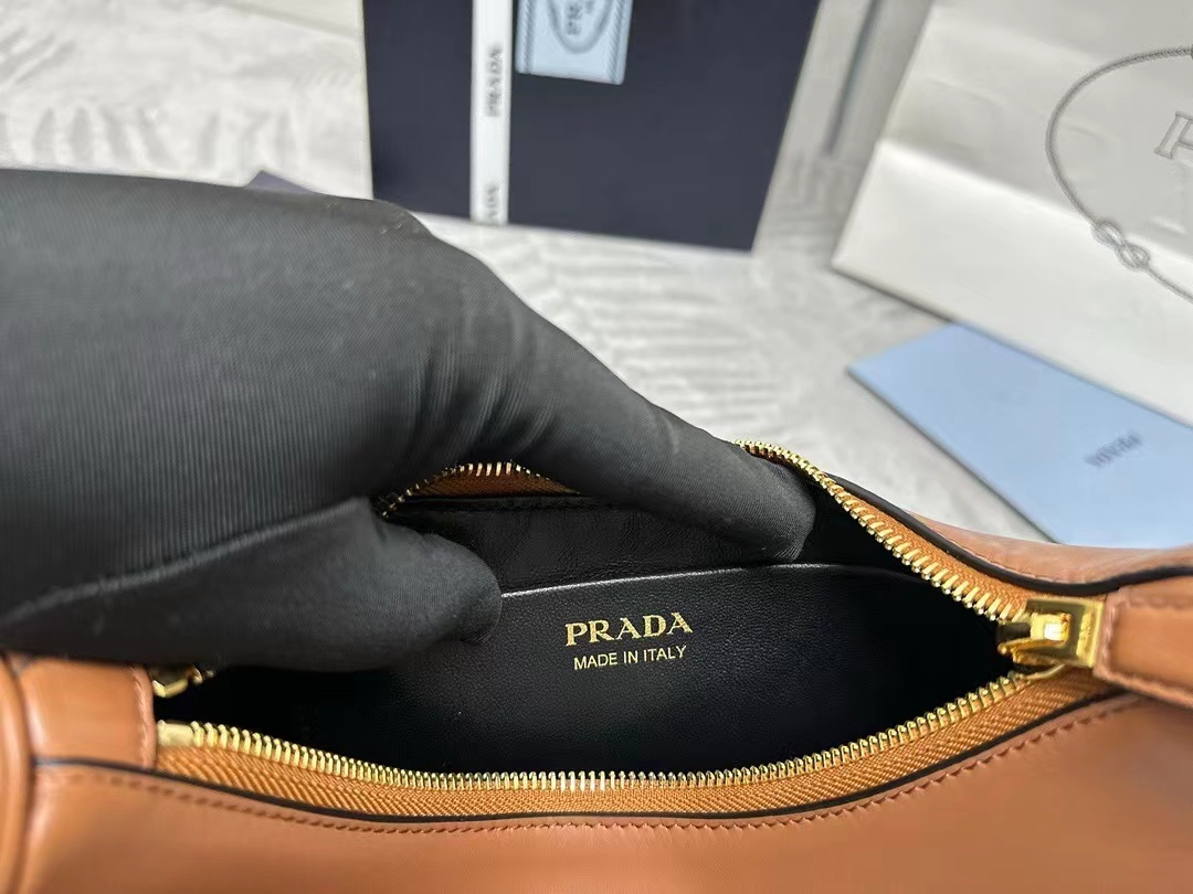 Prada Arqué small leather shoulder bag
