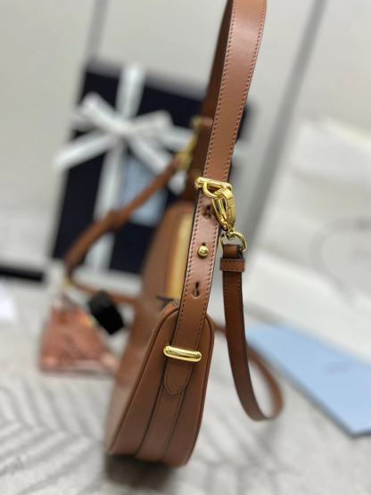 Prada Arqué small leather shoulder bag