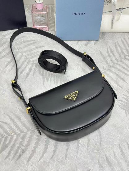 Prada Arqué leather shoulder bag with flap