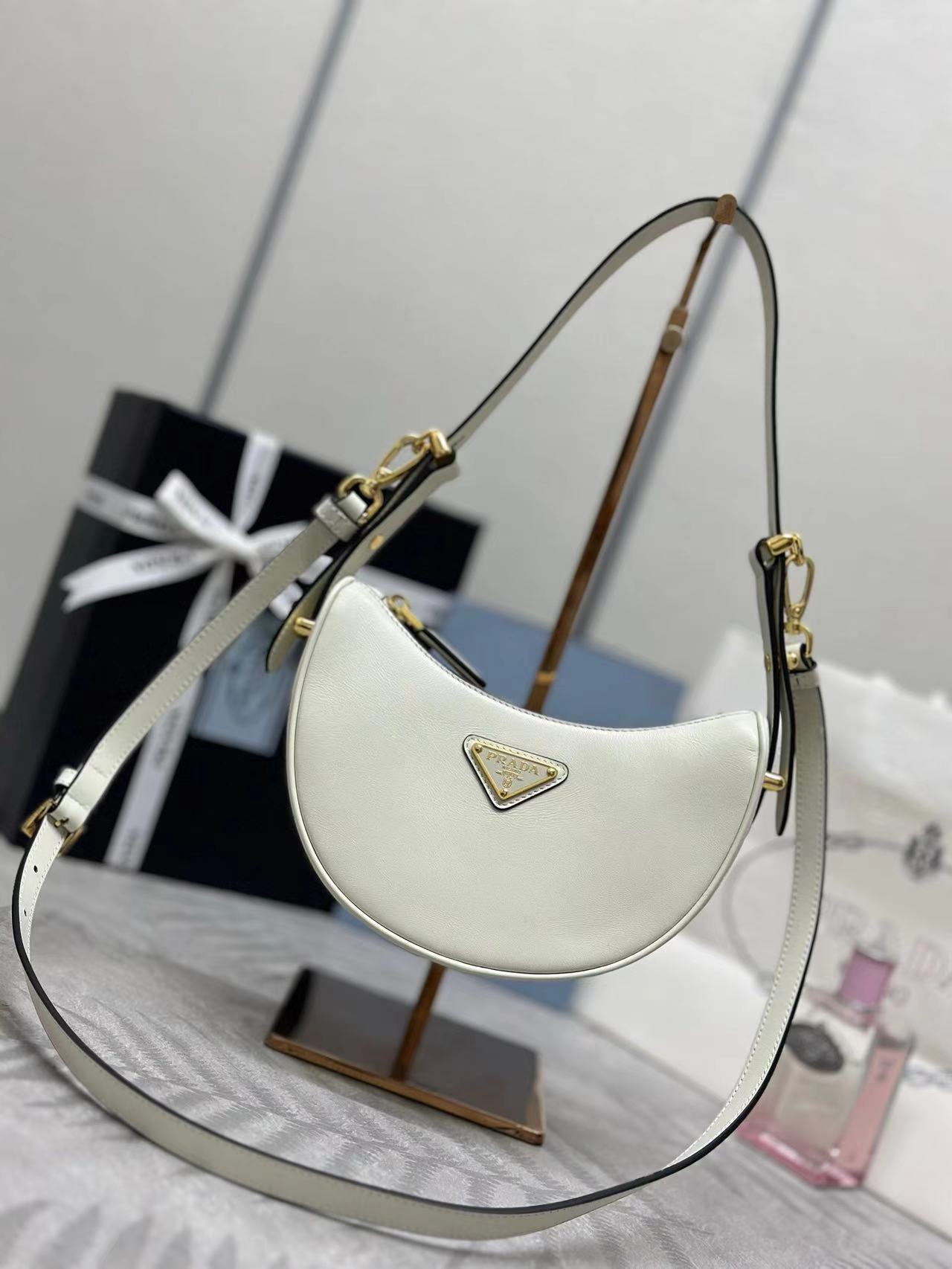 Prada Arqué leather mini shoulder bag