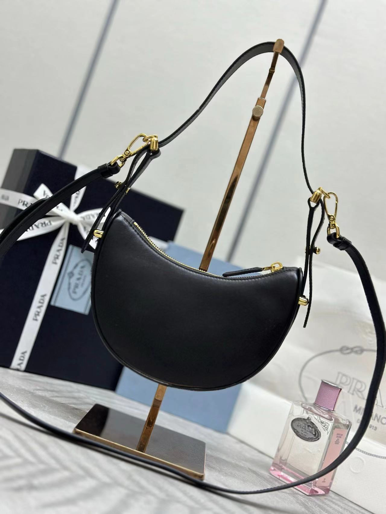 Prada Arqué leather mini shoulder bag