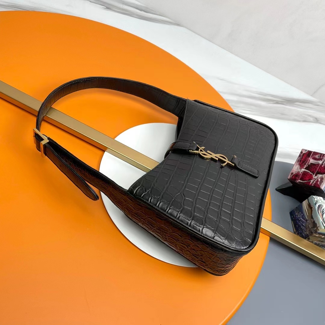 YSL LE 5 À 7 in crocodile-embossed shiny leather